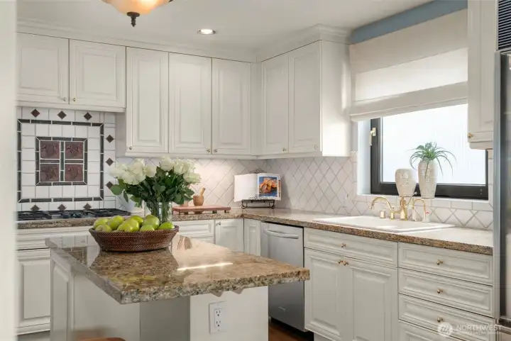 Five burner gas range, an abundance of cabinet & countertop space