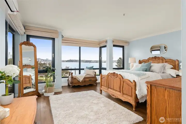 The primary suite, encompassed with the stunning views