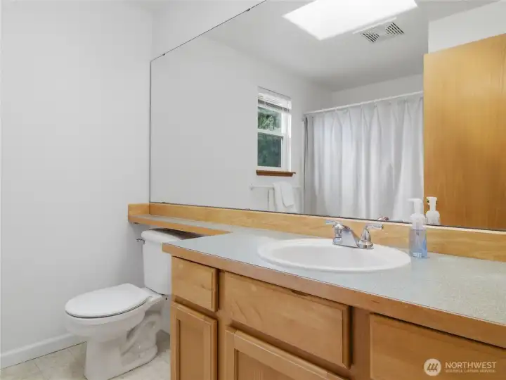 Upstairs Full Bathroom with Skylight