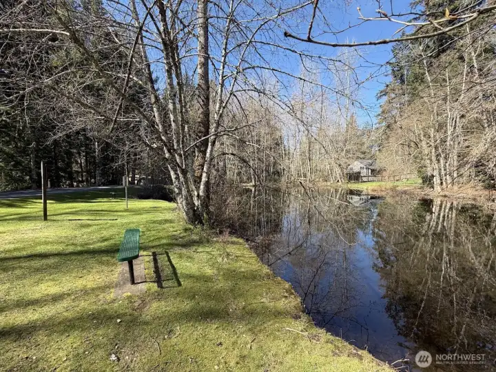Beautiful, quiet lake with benches, merry go round, and disc golf