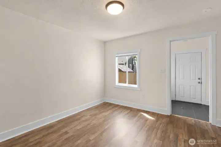 Unit 2 Family room. Virtually decluttered. Unit 2 Family room. Virtually decluttered.