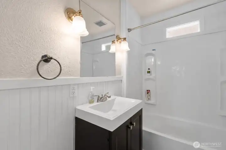 Unit 2 Bathroom. Virtually decluttered. Unit 2 Bathroom. Virtually decluttered.