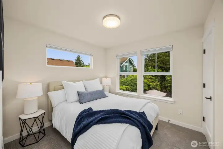 The second bedroom on the upper floor.