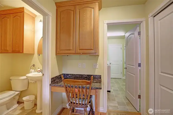 Organize your life at your desk located in the kitchen.