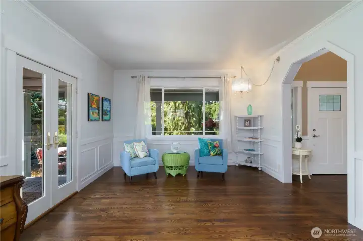 View of formal living room with patio doors to deck on the left of photo. Hardwood floors added in living, dining and office in 2018. View of formal living room with patio doors to deck on the left of photo. Hardwood floors added in living, dining and office in 2018.