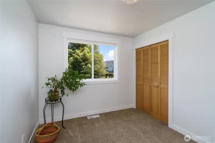 Bedroom # 3 with neutral carpeting Bedroom # 3 with neutral carpeting