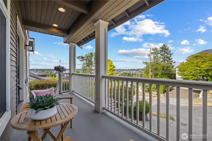 Take in sweeping views of Salmon Bay, Ballard, and the Seattle skyline from the inviting front porch.