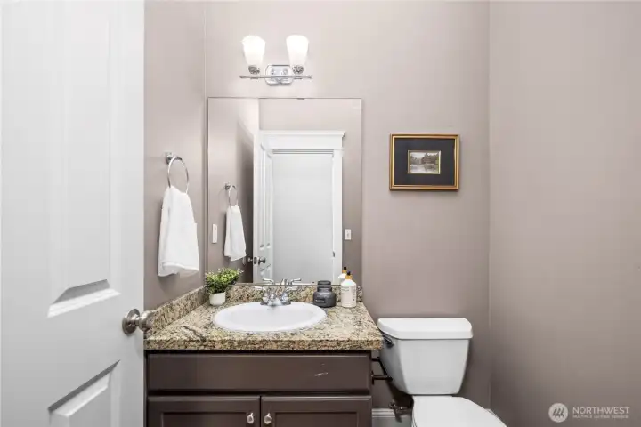 A dedicated main-floor powder room for guests is another thoughtful touch that makes this floor plan feel so beautifully designed.