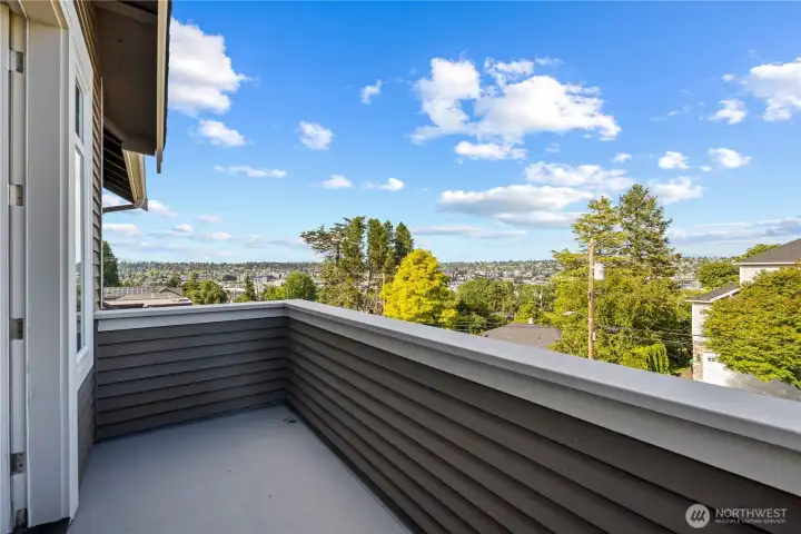 The private balcony off the primary suite creates a serene retreat rarely found in a bedroom. Wake up to fresh views in the morning and unwind with beautiful sunsets at the end of the day.