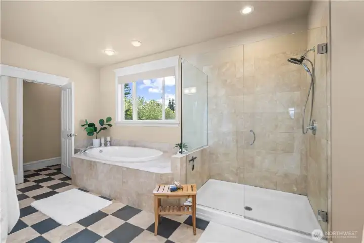 The 5-piece SPA-inspired primary bathroom offers a private retreat to relax, unwind, and recharge after a long day.