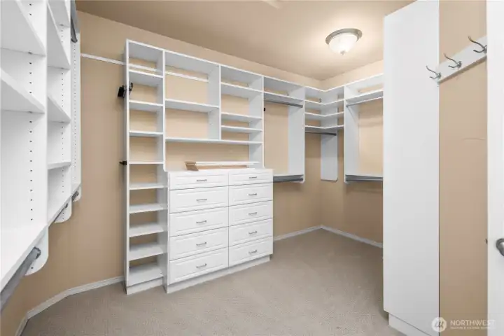 The generous walk-in closet offers ample space to organize your wardrobe and elevate your daily dressing routine.