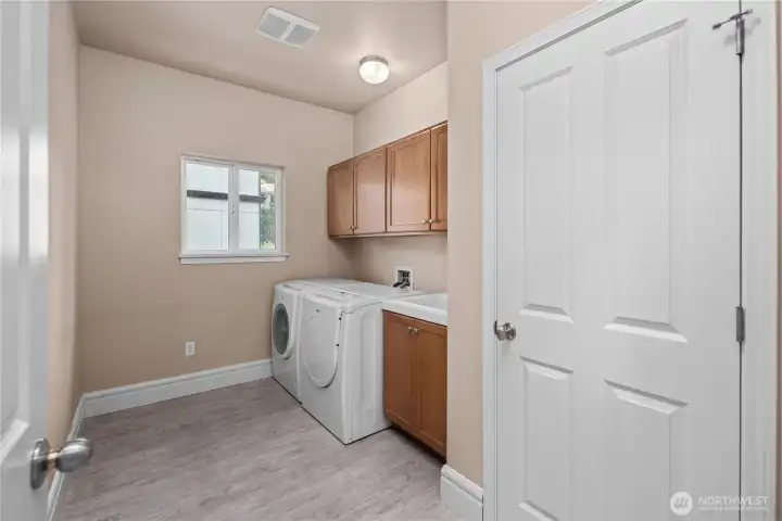 The conveniently located upper-level laundry room means less stair climbing and more everyday ease—a thoughtful design detail that truly enhances daily living.