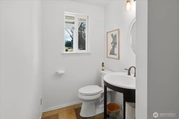 Main level half bath. Main level half bath.