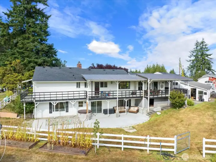Back of house with large patio. Back of house with large patio.