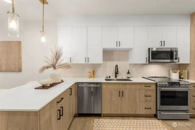 A kitchen that’s as functional as it is beautiful. Premium finishes, ample counter space, and contemporary lighting make this a dream space for cooking and entertaining.