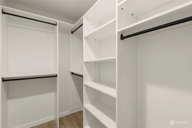 Bring your wardrobe dreams to life with this roomy walk-in closet. Custom shelving and ample hanging space make organizing a breeze.