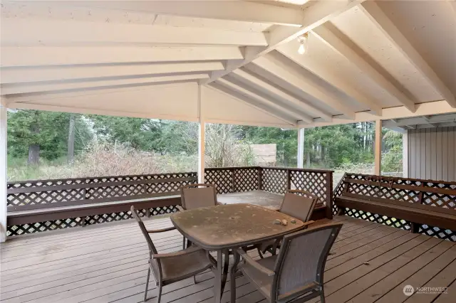 This covered deck is humongous, and has a hot tub which appears in great condition. The current owners never used it, but you can!