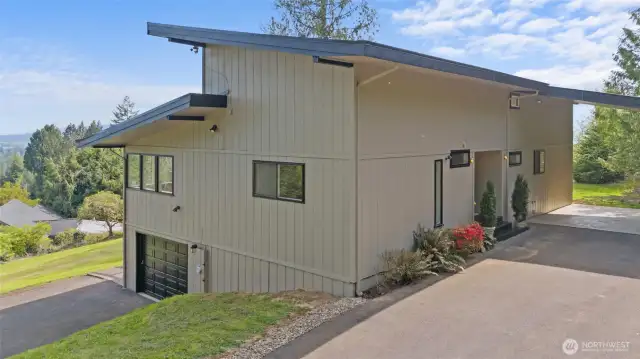 Entry to house is up under carport. Carport can cover up to four vehicles.