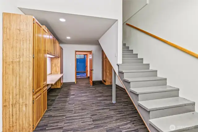 Laundry and stairway to upstairs bedroom