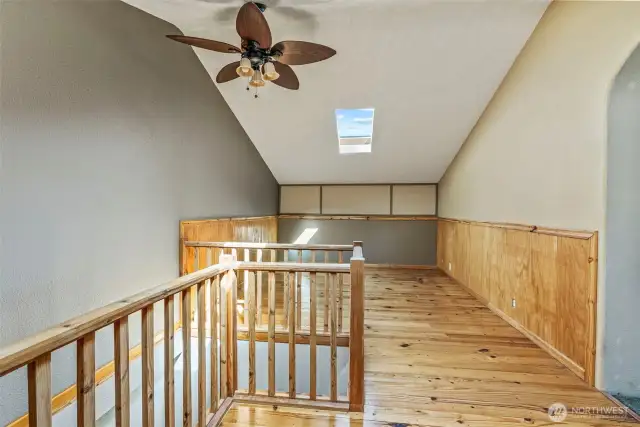 Primary suite upstairs over kitchen area.