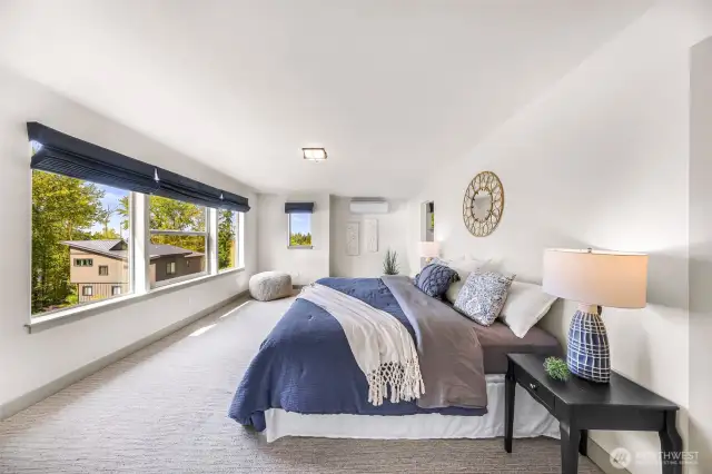 Large and spacious primary suite with room for a sitting area.