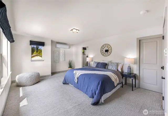 Walk in closet to the right, primary bathroom to the left, and a second closet!