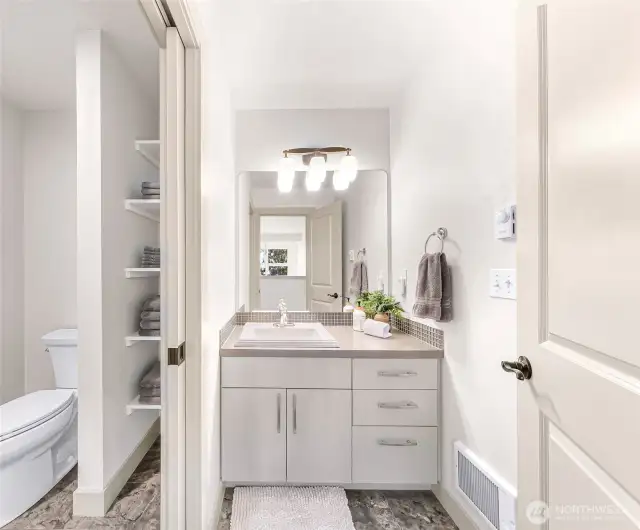 Full shared bathroom upstairs, privacy door for shower and toilet,