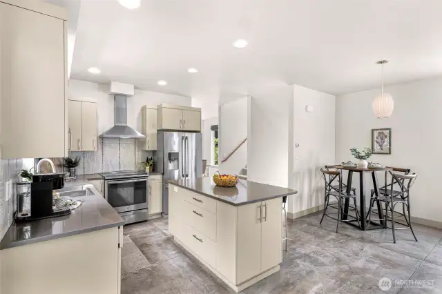 Space for a breakfast nook for more countertop space and eating area. Induction oven (with a gas hookup in back).