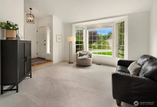 Living room off the entry and dining room.