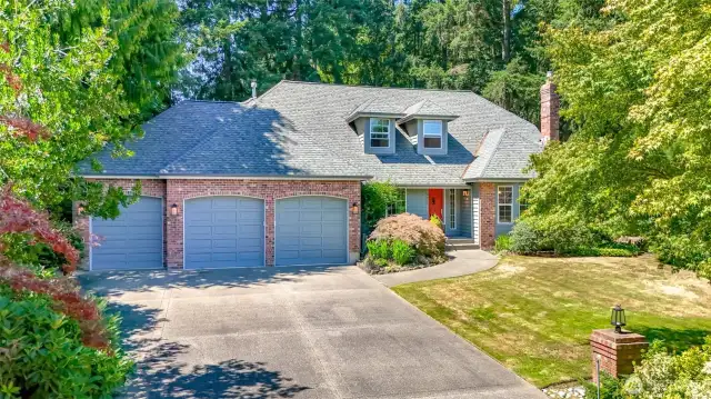 Gorgeous home in North Creek Estates with lush landscaping...