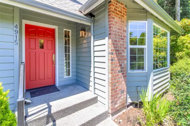 Entry porch with bright front door!