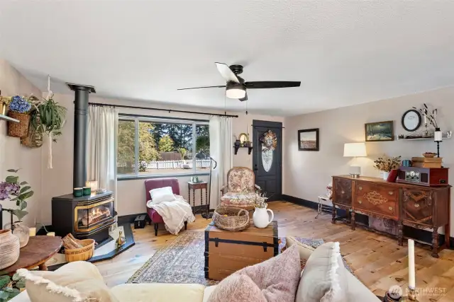 Barnwood floors throughout, 2 propane stoves, ceiling fans