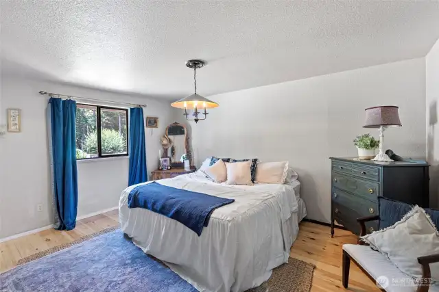 Primary Suite with adjoining full bath, which is also loaded with character