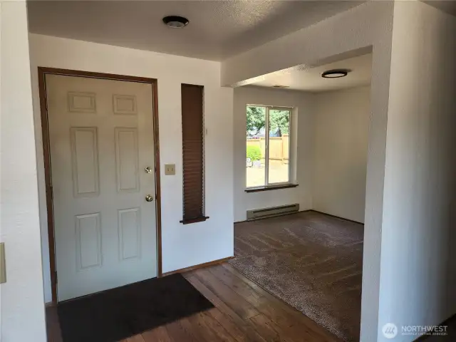 Entry to the home, den/office space to the right side of photo could be enclosed w/barn door to create another room.