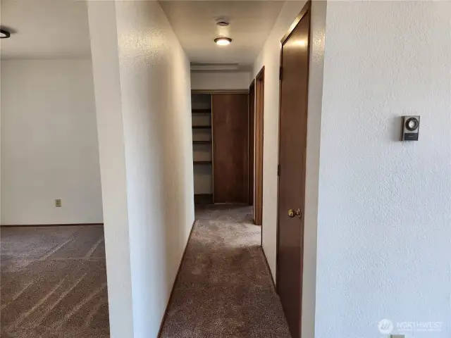 Hallway to bedrooms and baths.