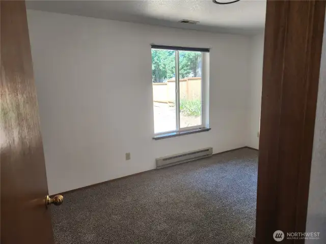 Good sized bedroom 2, window view is facing the front yard.