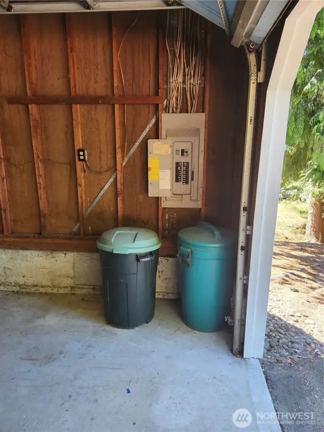 Electrical panel just to the right of the garage.