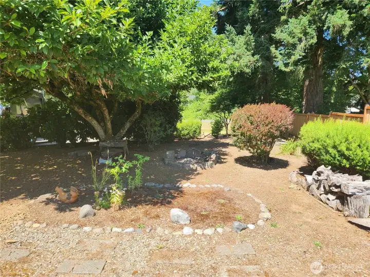 Another view of the nicely landscaped front yard.