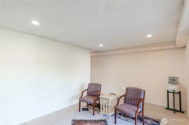 Lower level family room has vinyl floors.