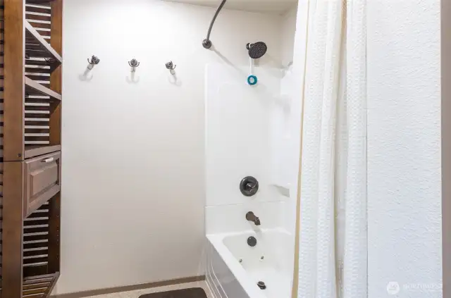 A pocket door allows privacy in this area.