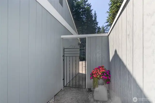 View of the front courtyard with gate closed.