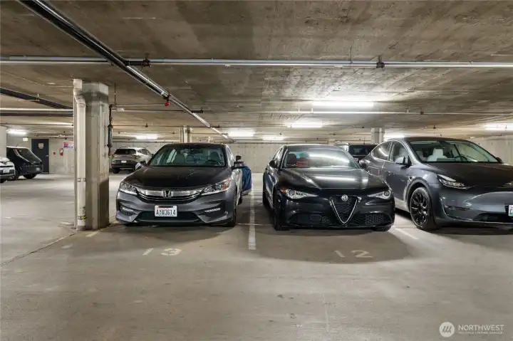 Two dedicated parking spaces are conveniently located on the main level within the secure, gated garage.