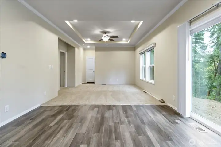 Family Room with 2 bedrooms on left and main bath at end