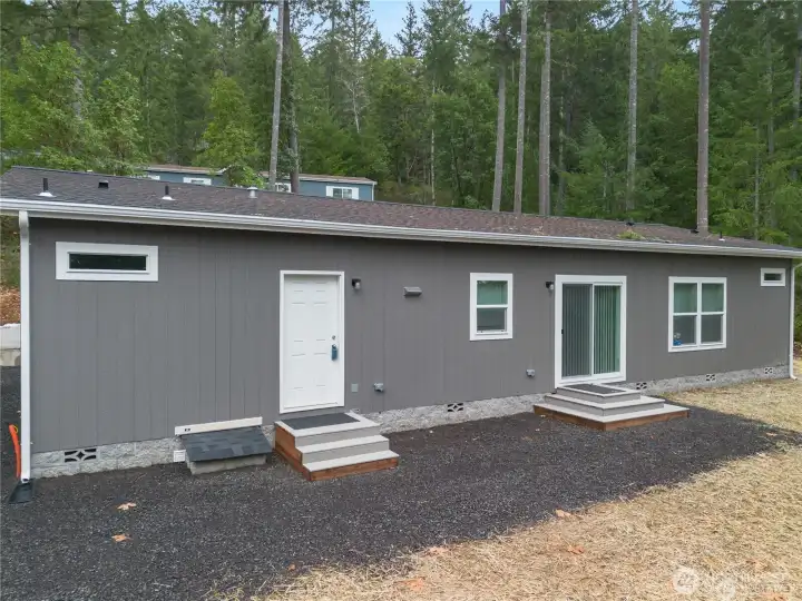 Utility room door entrance off of kitchen