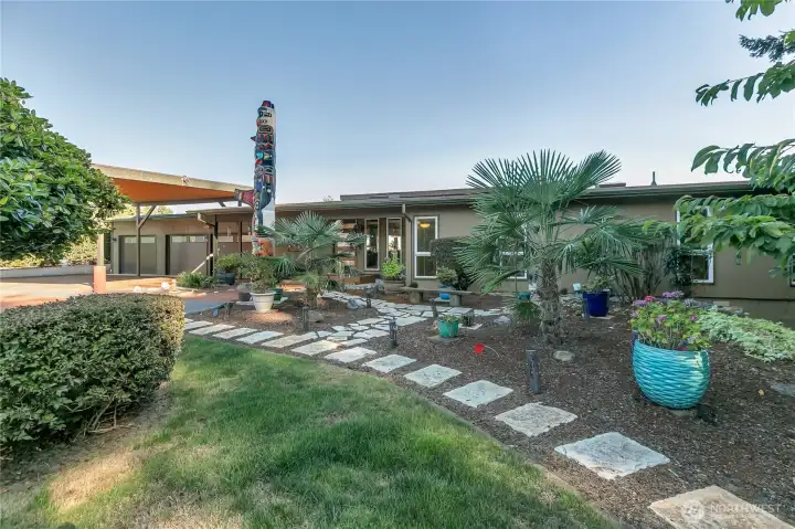 Front of Home. Totem pole is negotiable - can be removed if wished