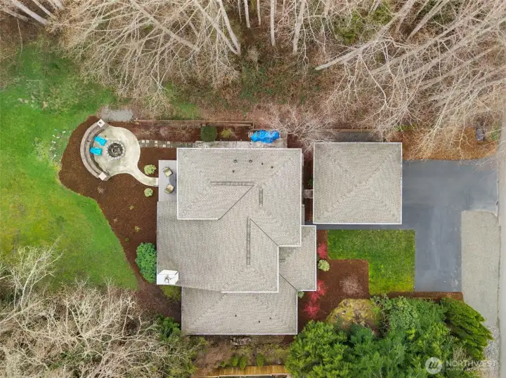 Gorgeous but easy care native landscaping wraps around the property, providing beauty and privacy.