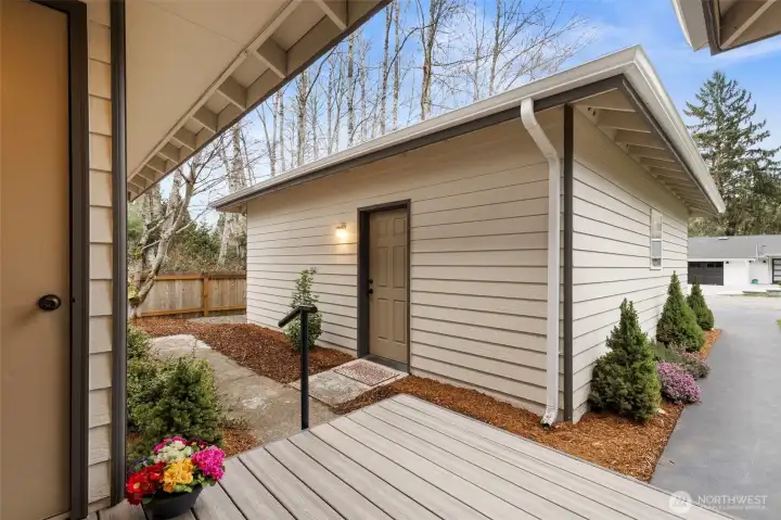 From the front porch, access the detached two-car garage.