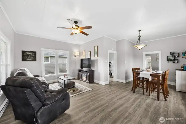 Tall ceilings matched with large windows make this space so inviting and warm!