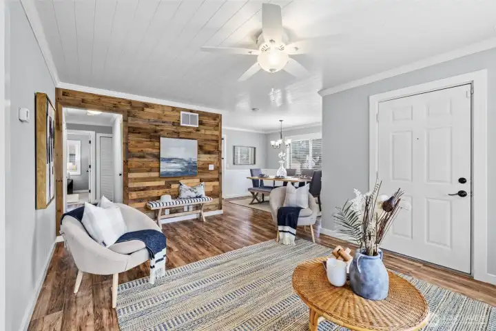 Flowing layout from living room into dining room and bedroom space