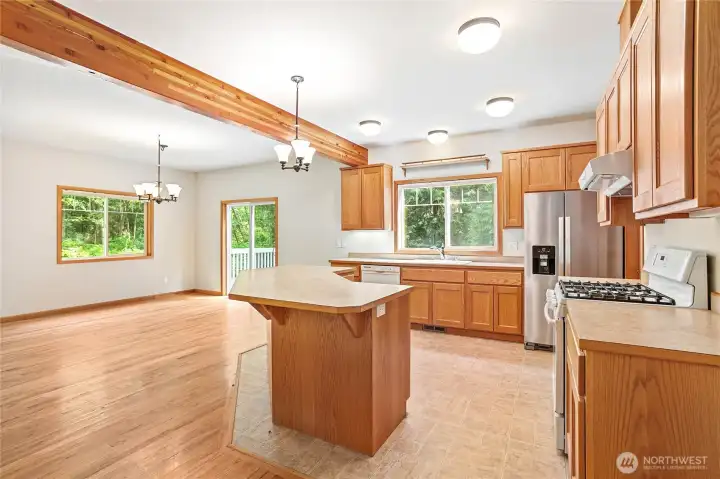 Kitchen and Dining area. Living Room to the left. Kitchen and Dining area. Living Room to the left.